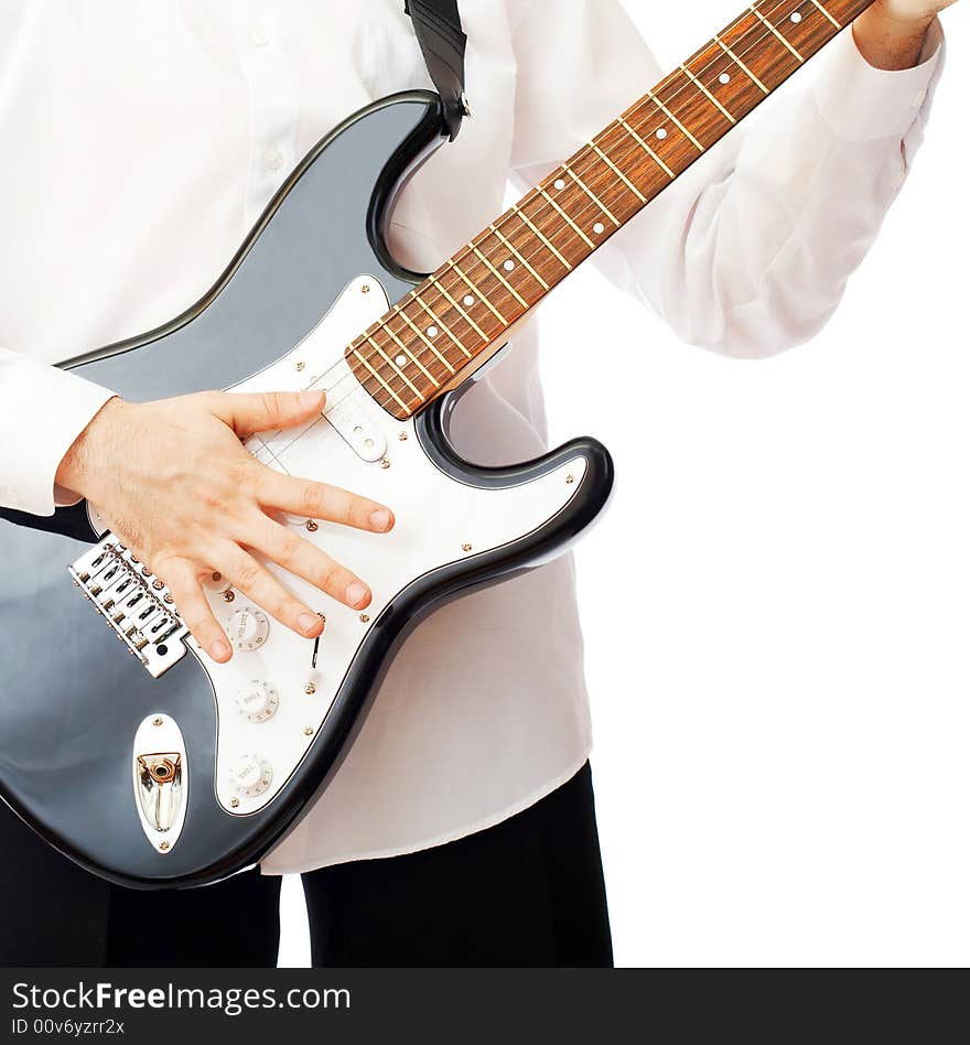 Electric guitar in hands over white