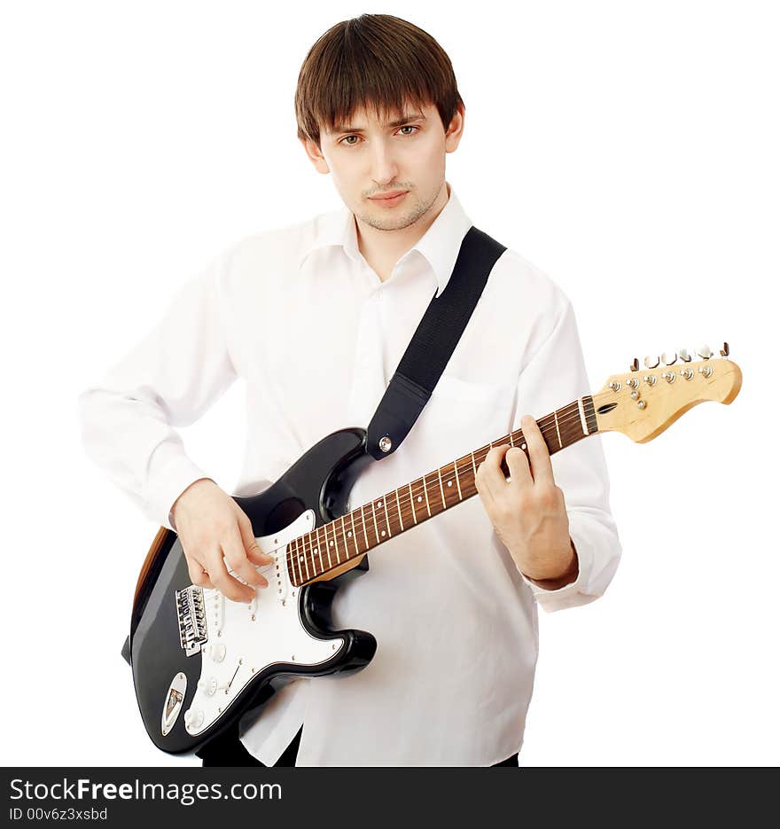 Young man with guitar isolated on white