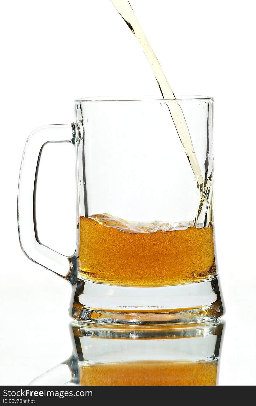 Beer in glass on the white background