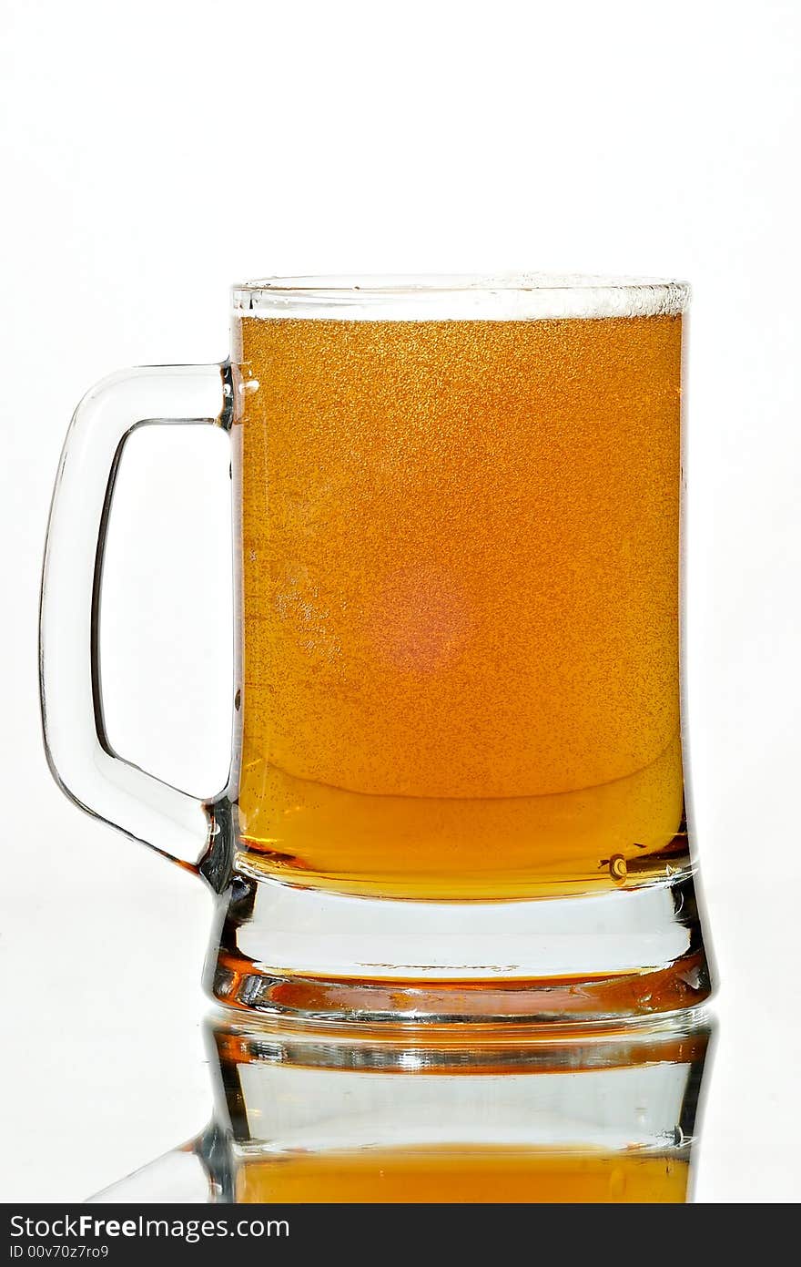 Beer in glass on the white background