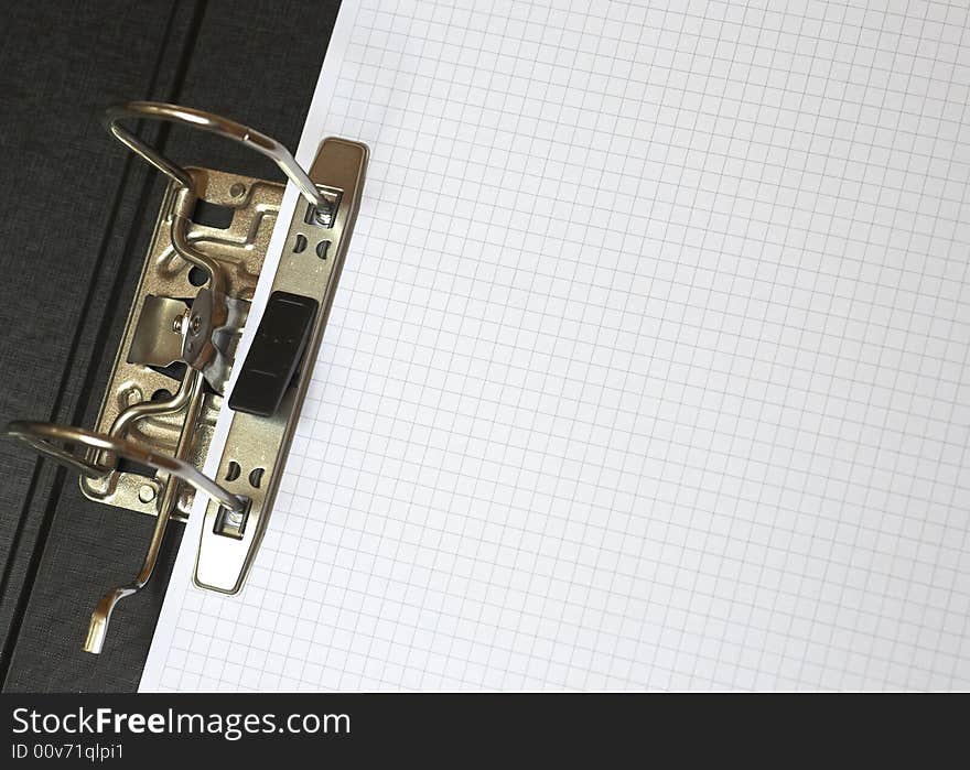 A black lever arch file contained a sheet of graph paper.