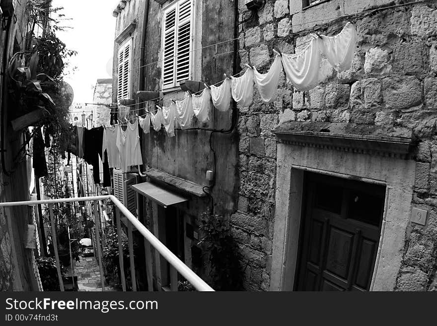 A clothesline of laundry drying. (Dubrovnik, Croatia). A clothesline of laundry drying. (Dubrovnik, Croatia)