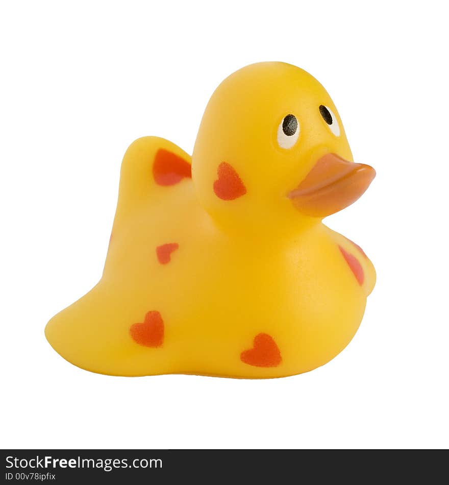 Yellow rubber duck with red hearts, isolated on a white background