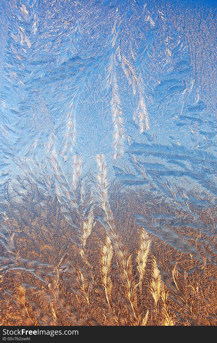 Winter ice pattern on a window glass