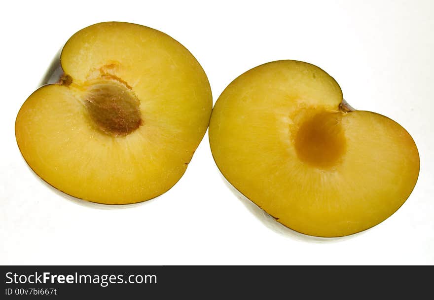 Plum cut in half