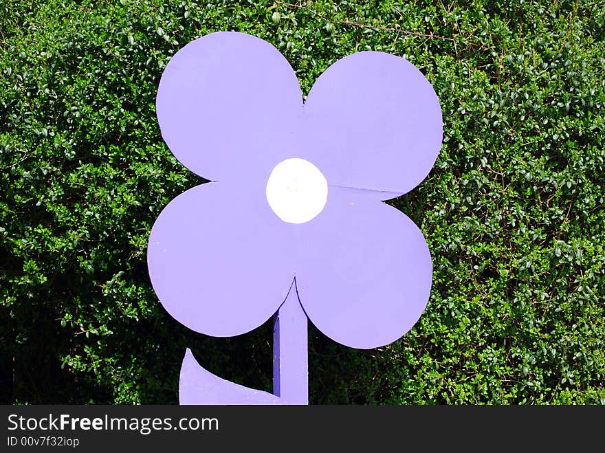 Cutout of a large flower depicting a flower yard