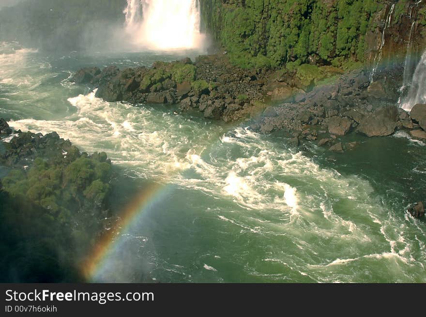 Iguazu river rapids, and a rainbow. Iguazu river rapids, and a rainbow