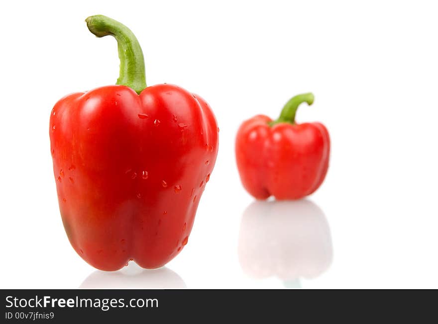 A red bell pepper with water drops. A red bell pepper with water drops