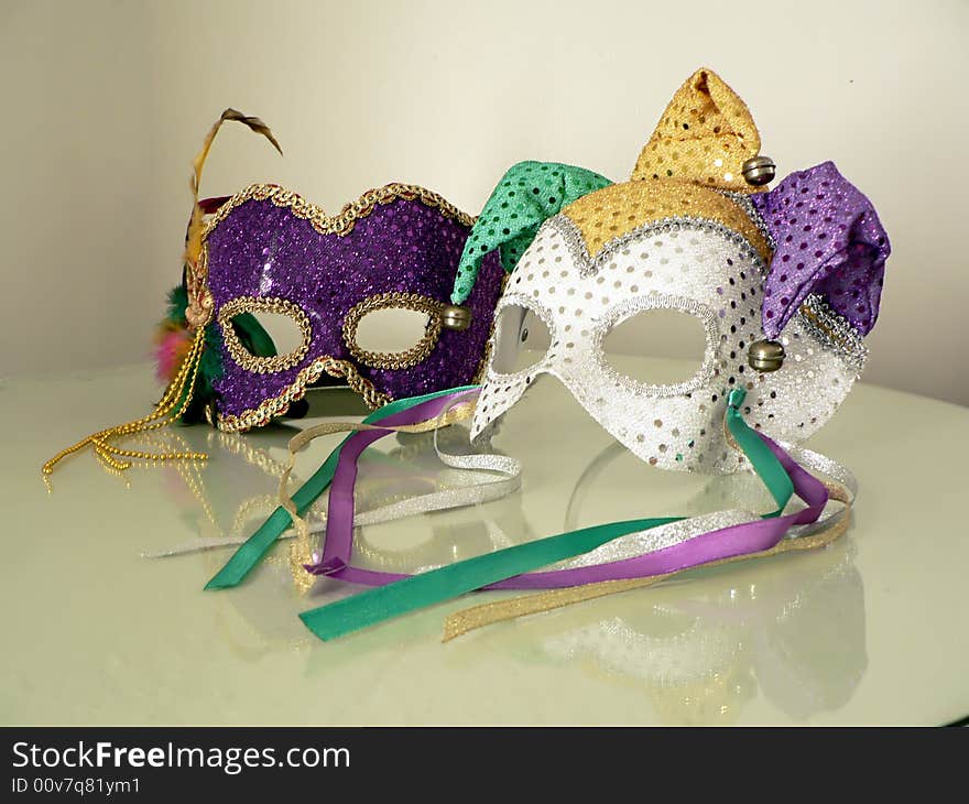 A pair of carnival mask on glass. A pair of carnival mask on glass