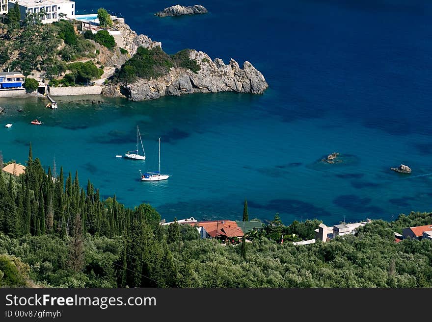 Clear blue waters bay at Paleokastrita - Corfu island. Clear blue waters bay at Paleokastrita - Corfu island