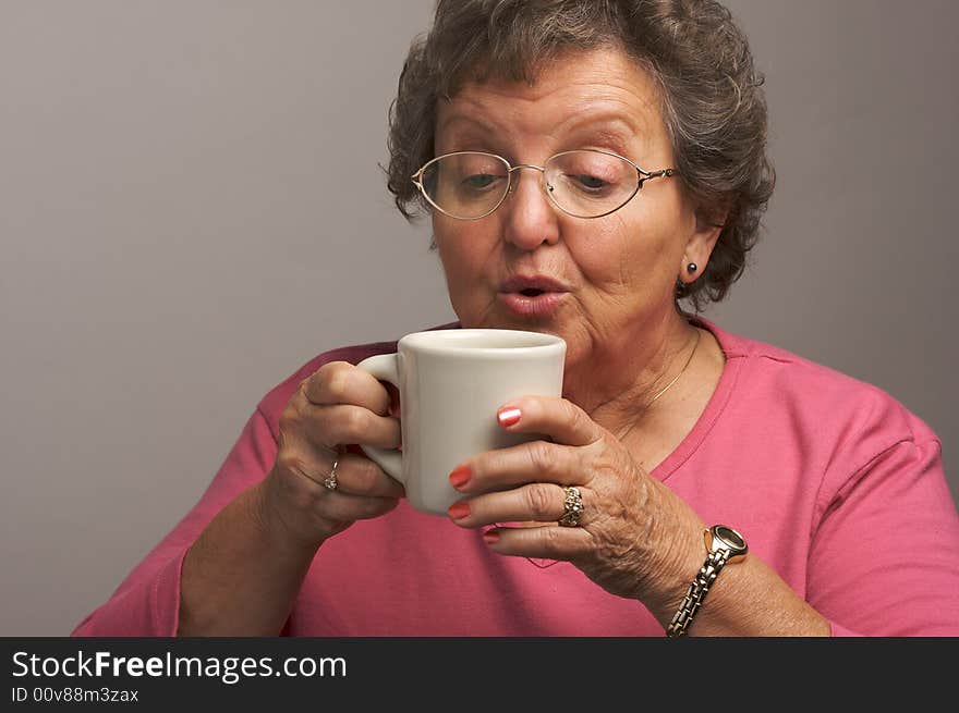 Grandma Enjoys a Cup of Coffee. Grandma Enjoys a Cup of Coffee