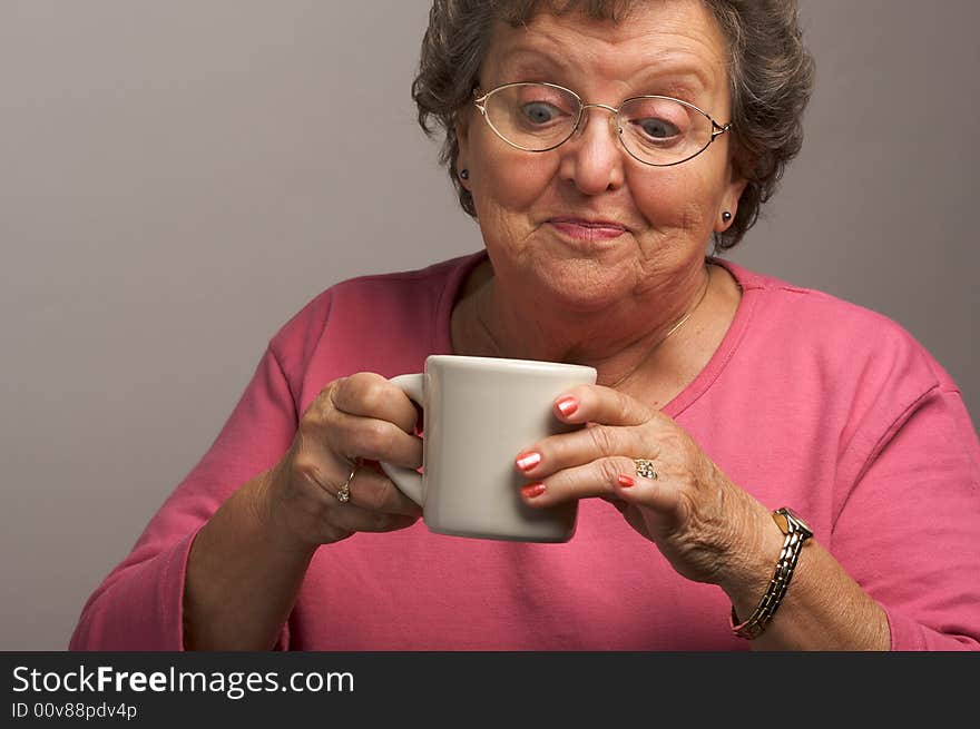 Grandma Enjoys a Cup of Coffee. Grandma Enjoys a Cup of Coffee