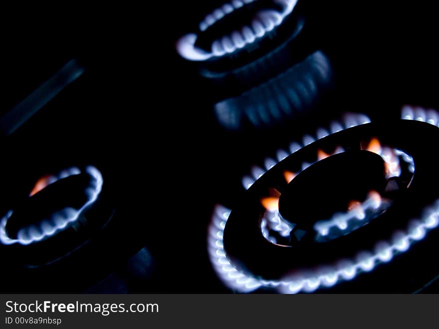 Flames of gas stove in the dark