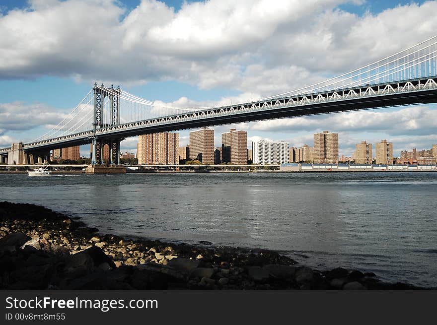 Brooklyn bridge river view and buildings