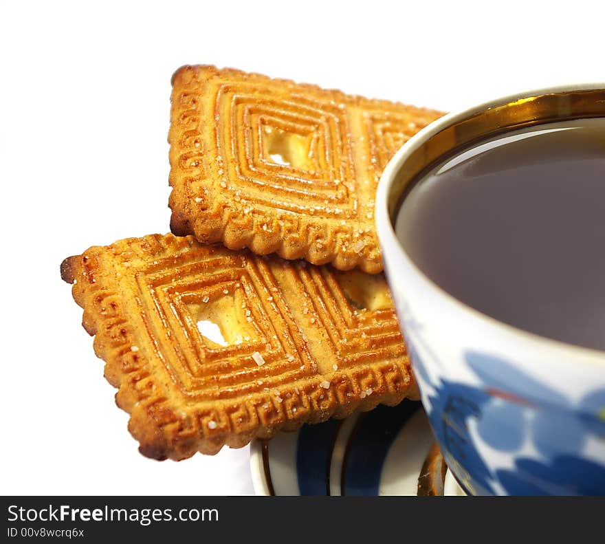 Cup of tea and two cookies