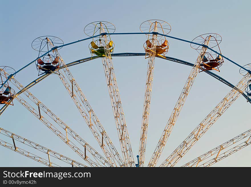 Carousel top path on blue sky. Carousel top path on blue sky