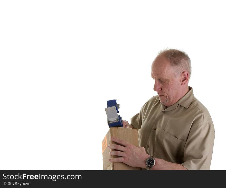 An old guy with a tape gun, trying to tape up a box. An old guy with a tape gun, trying to tape up a box