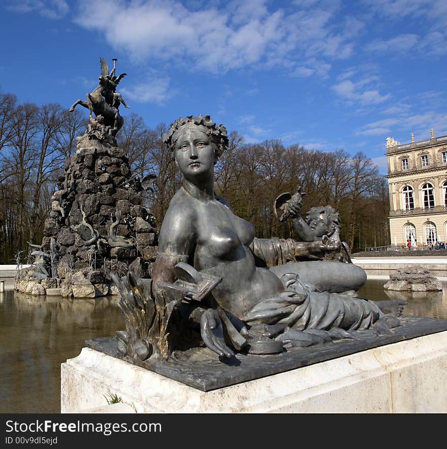 Sculptures and a fountain in Castle of Ludwig The Bavarian on Island Herreninsel ( Lady Island ) at Chiemsee. South Bavaria .  Not so far from Traunstein City. Sculptures and a fountain in Castle of Ludwig The Bavarian on Island Herreninsel ( Lady Island ) at Chiemsee. South Bavaria .  Not so far from Traunstein City.