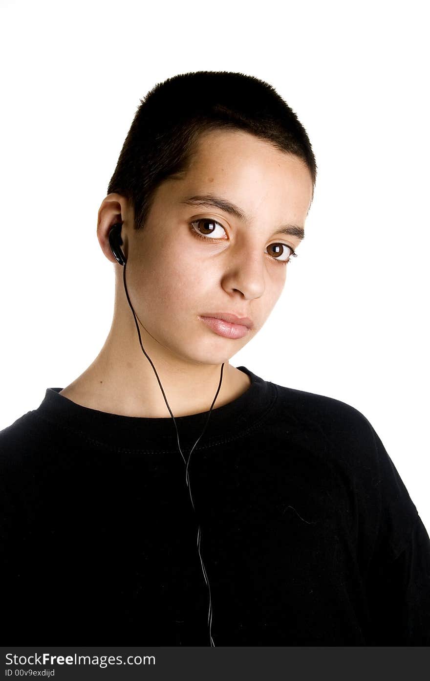 Teenage boy listening to a MP3 player