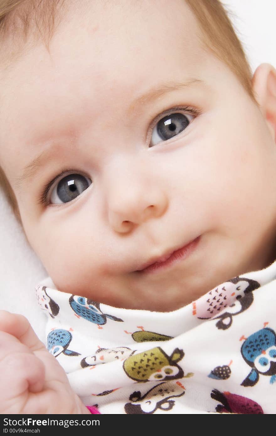 Bright closeup portrait of little baby