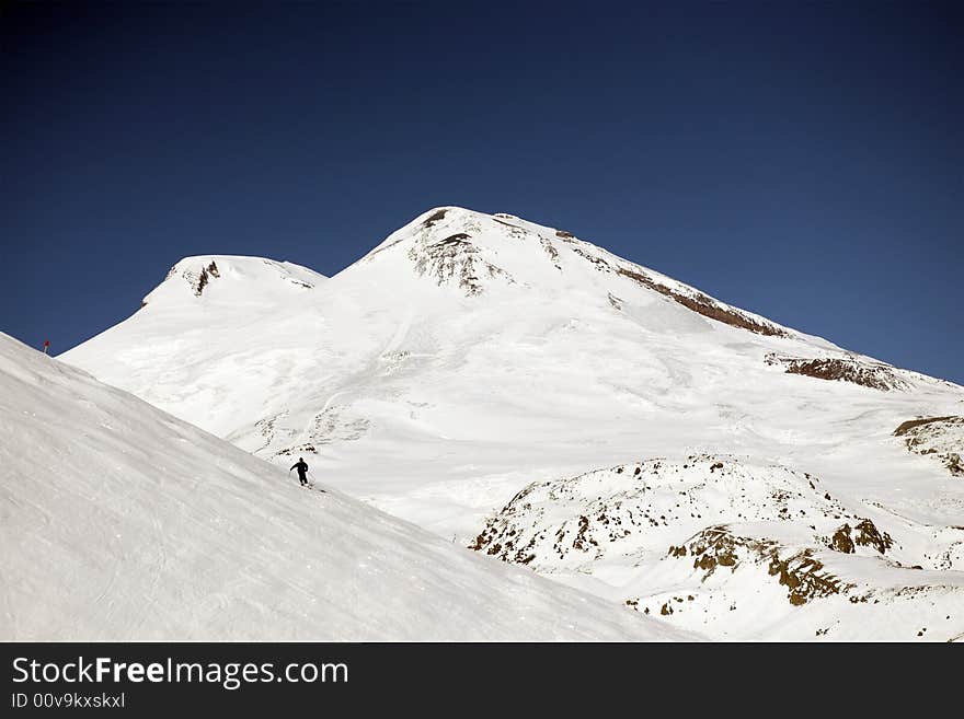 Winter mountain peaks and a lot of snow. Winter mountain peaks and a lot of snow