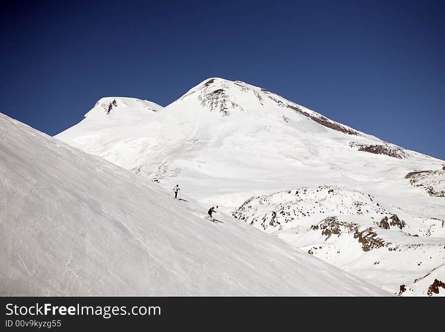 Winter mountain peaks and a lot of snow. Winter mountain peaks and a lot of snow