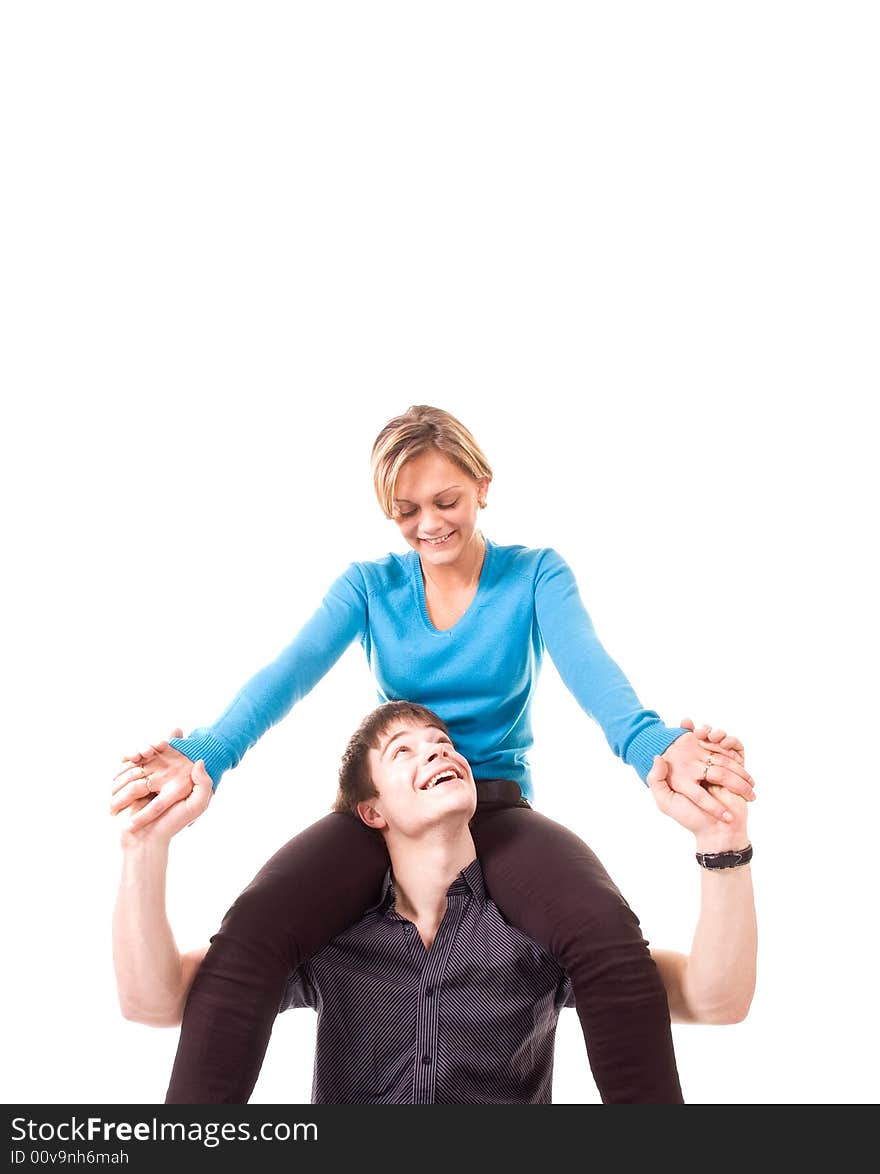 Young couple is having fun (isolated on white).