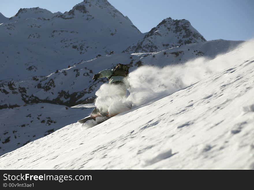 Snowboard freeride in high mountains