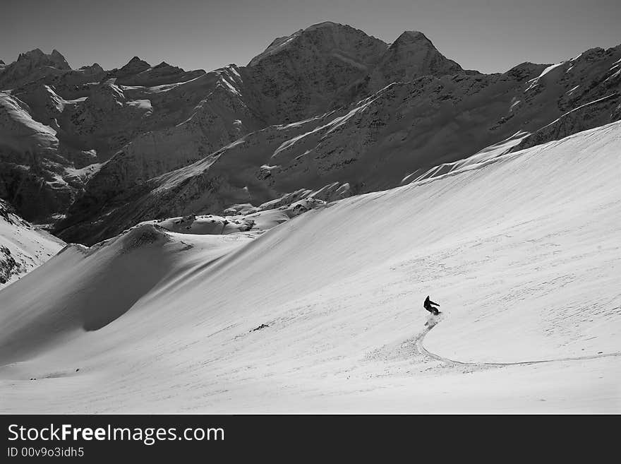 Snowboard Freeride In High Mountains