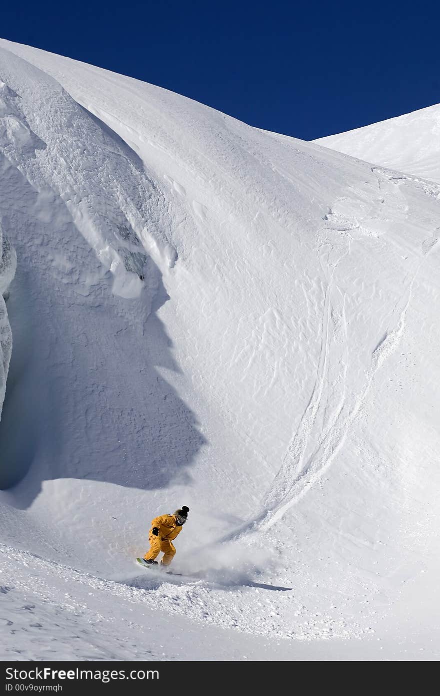 Snowboard freeride in high mountains