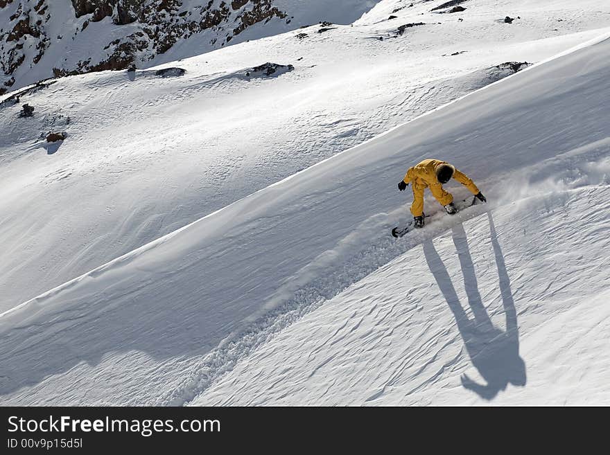 Snowboard freeride in high mountains