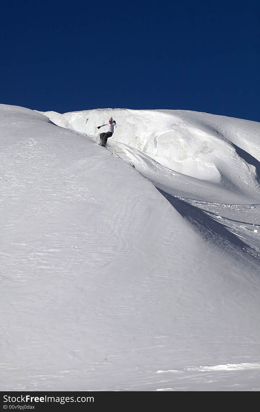 Snowboard freeride in high mountains