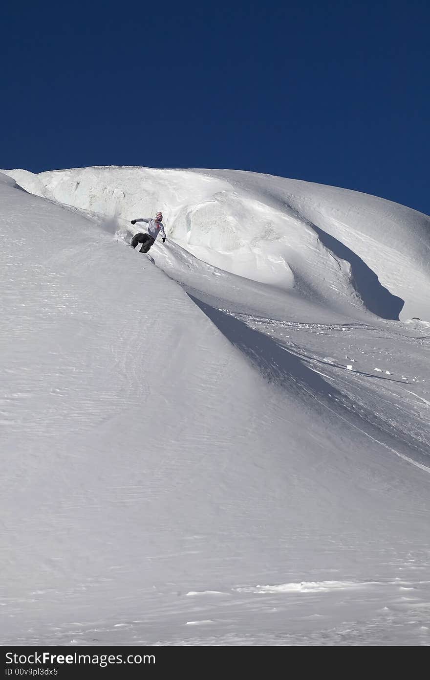 Snowboard freeride in high mountains