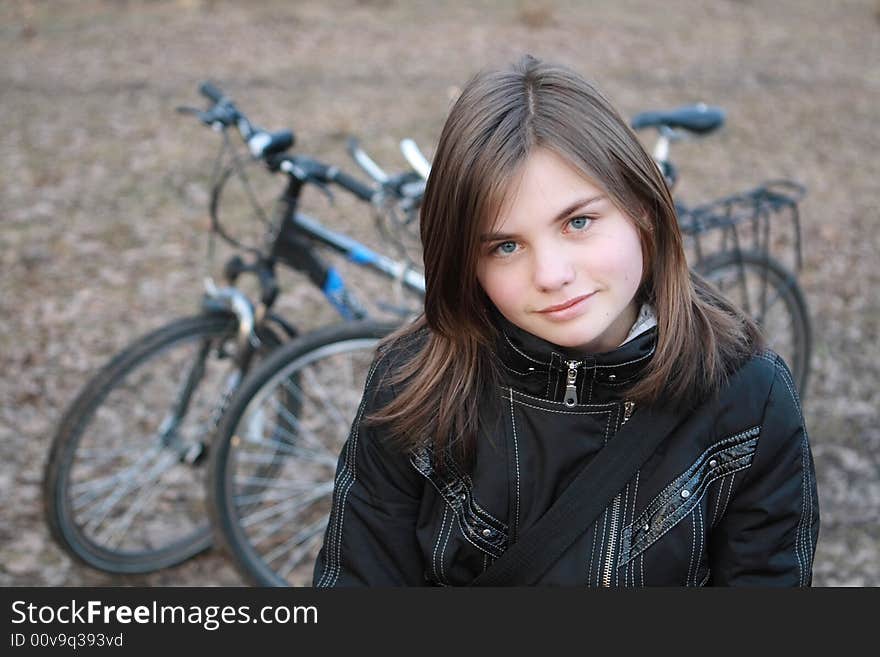 The girl on bicycle walk. The girl on bicycle walk