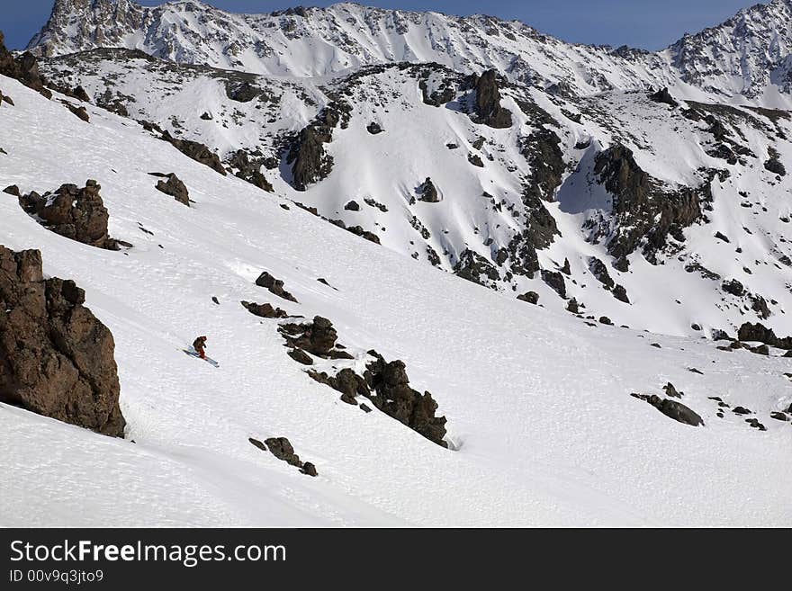 Ski freeride in high mountains, sky, winter