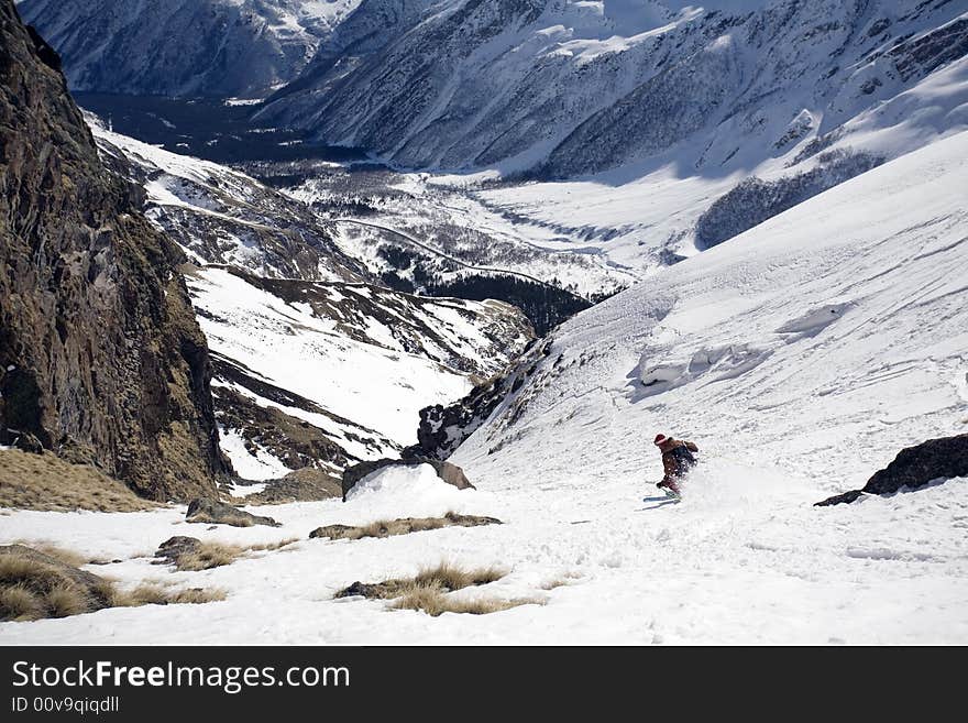 Ski freeride in high mountains, sky, winter