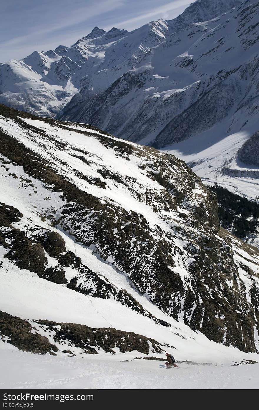 Ski freeride in high mountains, sky, winter