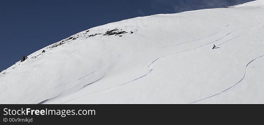 Snowboard Freeride In High Mountains