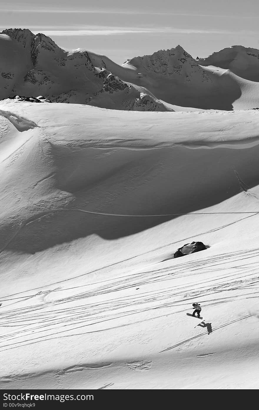 Snowboard freeride in high mountains