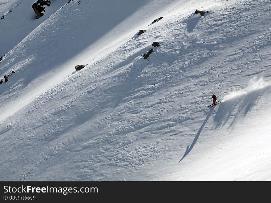 Ski freeride in high mountains, sky, winter