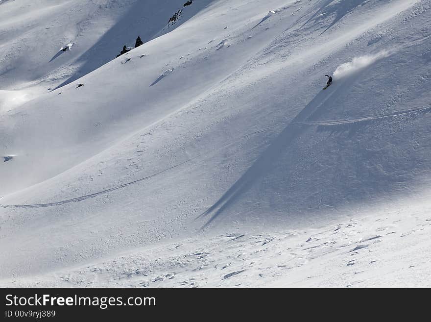 Ski freeride in high mountains, sky, winter