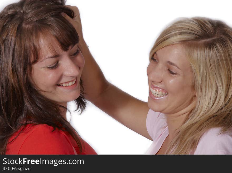 Playful Girls Pulling Hair