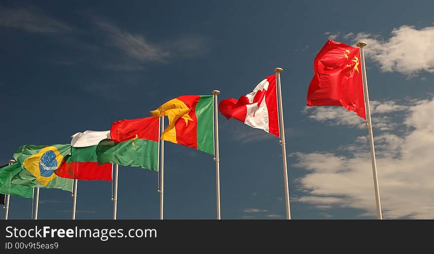 Photo of colorfull flags in a sunny windy day. Photo of colorfull flags in a sunny windy day