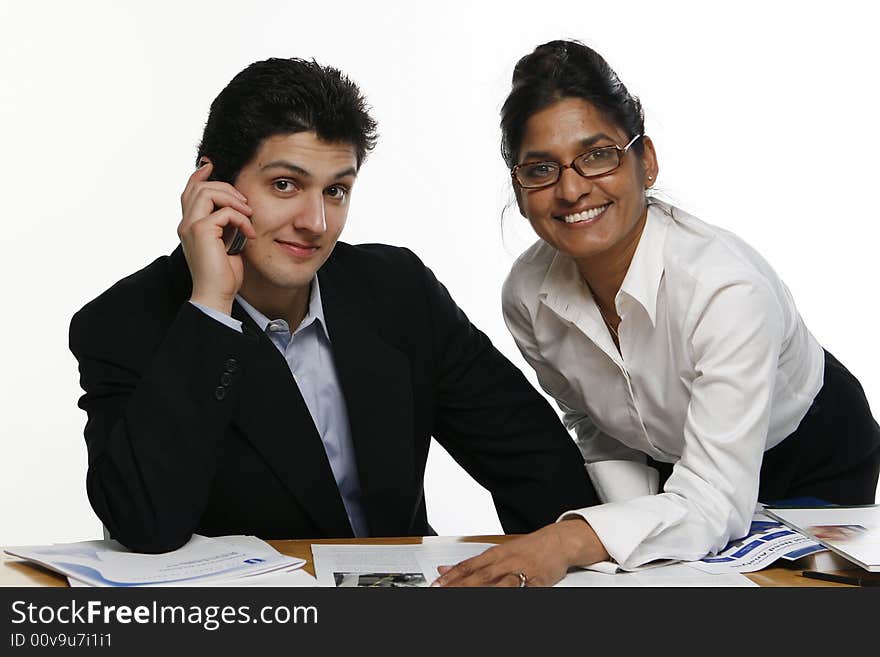 Male and female colleagues working together. Male and female colleagues working together