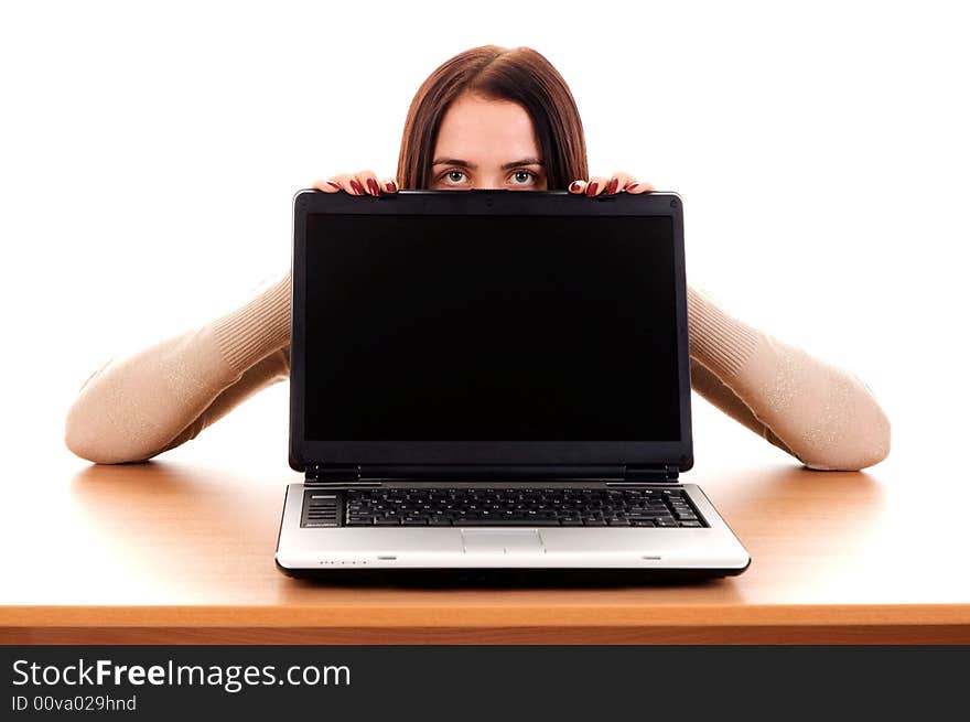 Girl with laptop on table. Girl with laptop on table