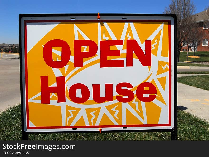 Sign for open house outside apartment complex. Sign for open house outside apartment complex.