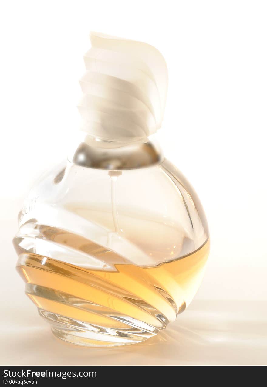 Bottle of perfume, isolated on white background