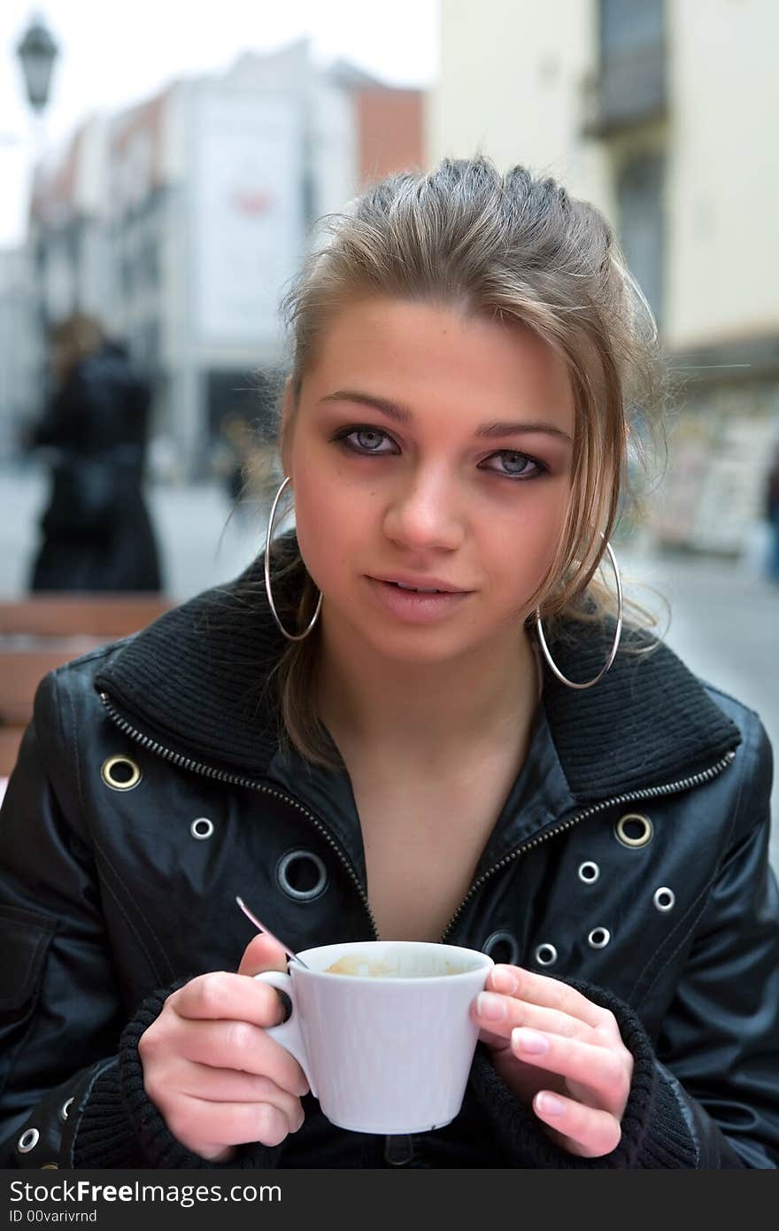 student in cafe street in old city