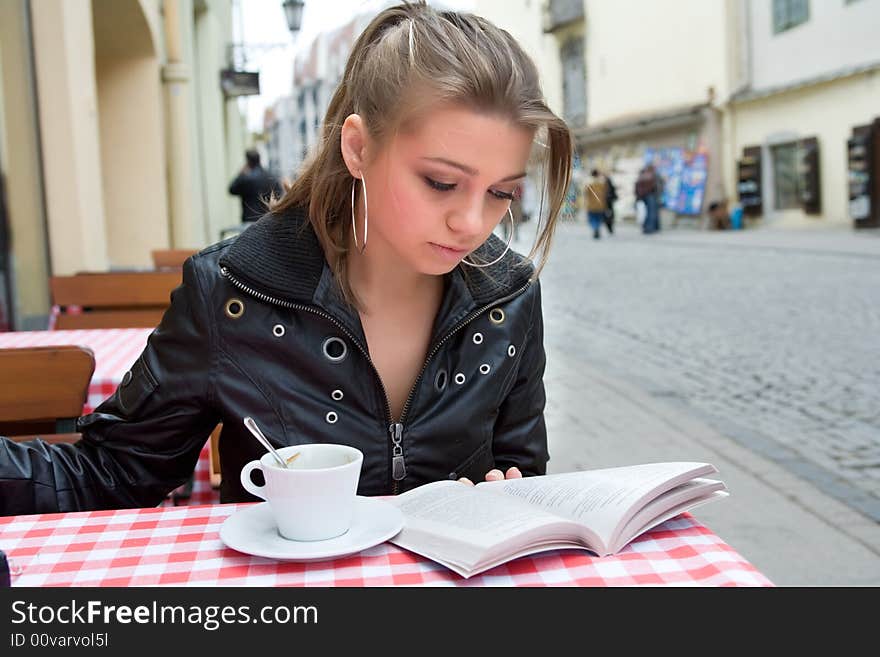 Student in cafe street in old city