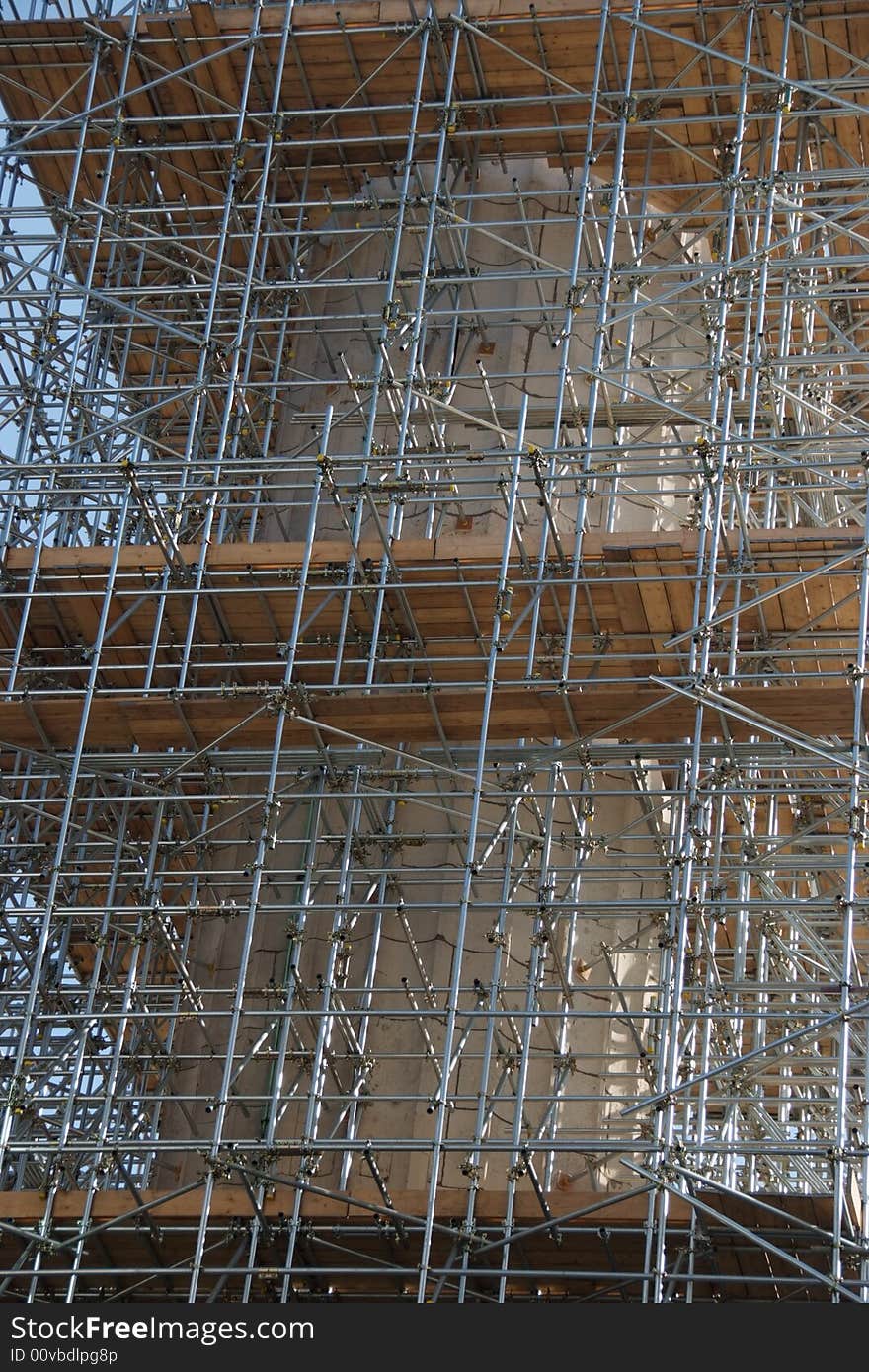 Scaffolding covering a building construction